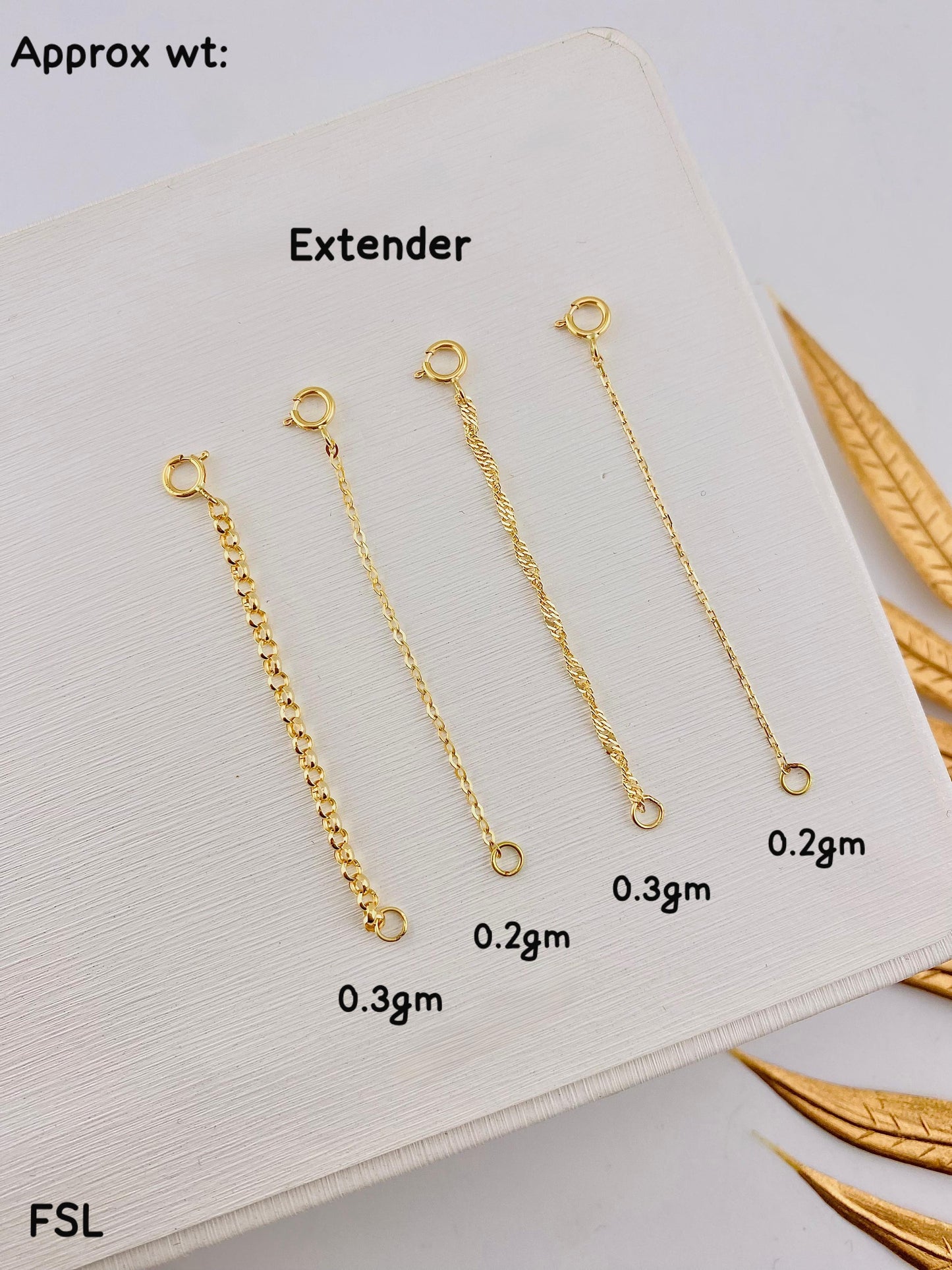 Gold extenders with weight measurements on a light background