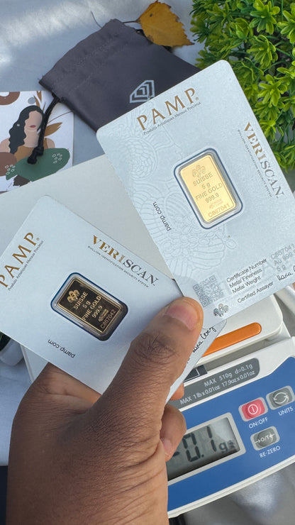 Gold bars in PAMP packaging with a digital scale in the background